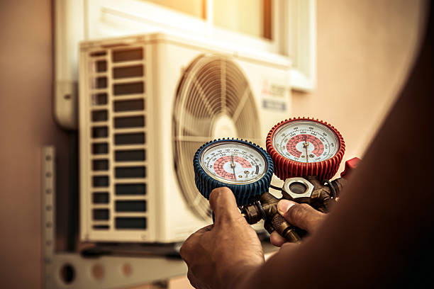 Professional Emergency Hvac technician working in West Falmouth, MA